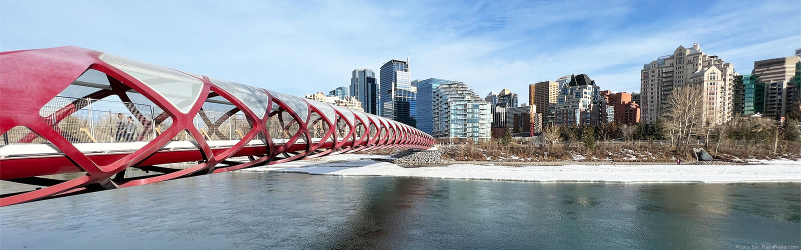 Peace Bridge right side Bow River in Calgary city YYC, Alberta province, Canada, calgary in spring snow melting, photo taken by Reza, Mars 2023