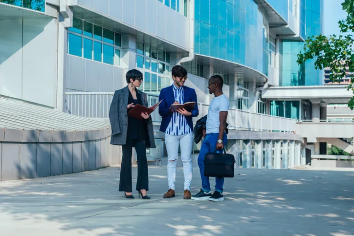 A trio of Bay River College students preparing for international business management jobs