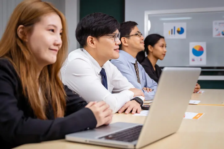 A row of students in an international business management entry-level jobs training session