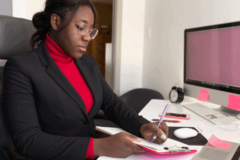 Business student completing office tasks as part of a practicum program