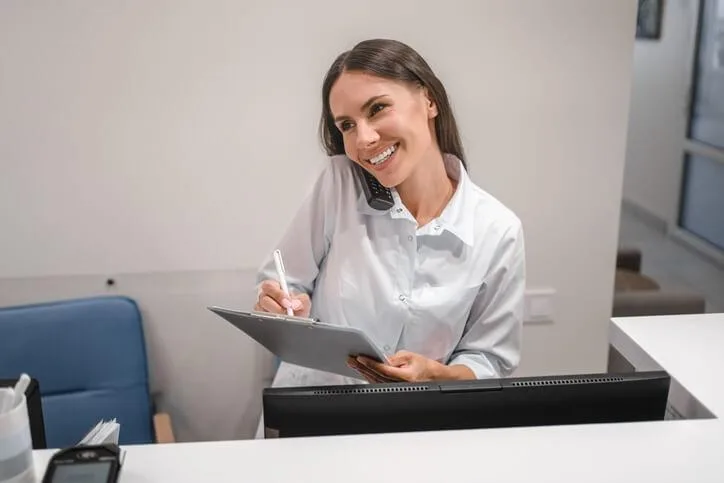 A Medical admin working at clinic reception