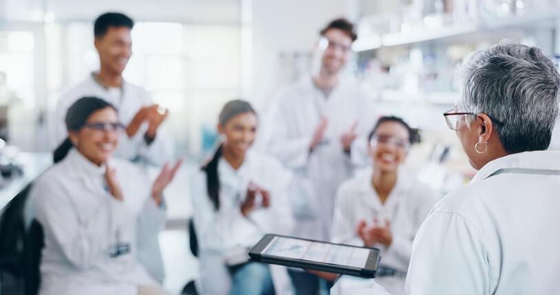A student learning infection prevention and control activities in a lab setting