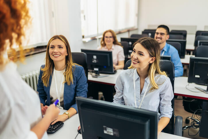 A classroom at a career college with admin students