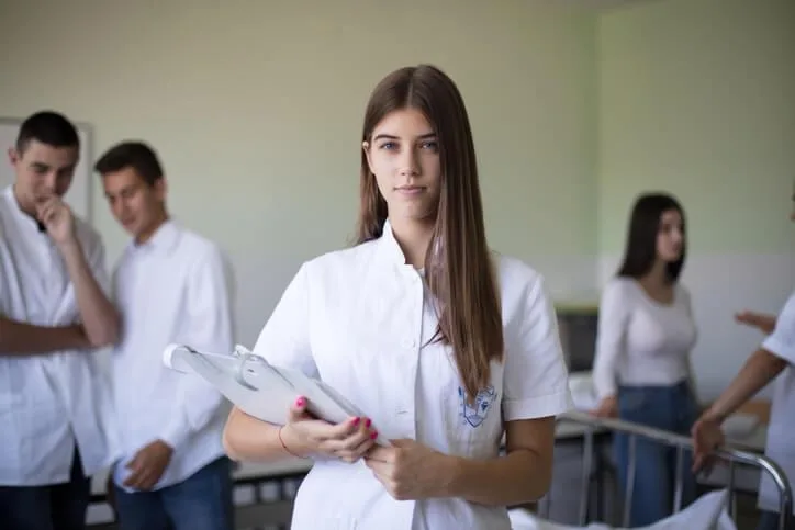 A student training to become a medical office administrator