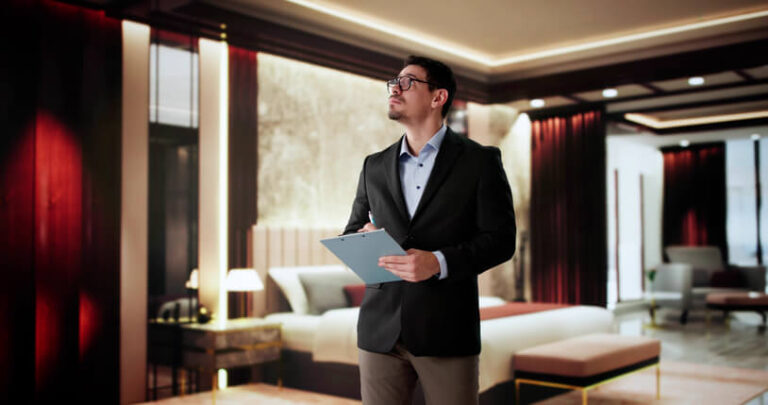 A hospitality business student reviewing a hotel operations checklist