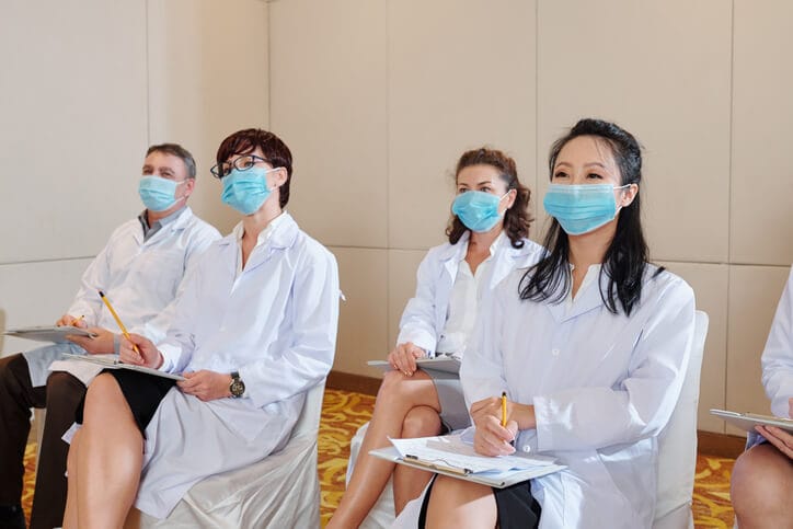 Healthcare staff team participating in an infection control training session