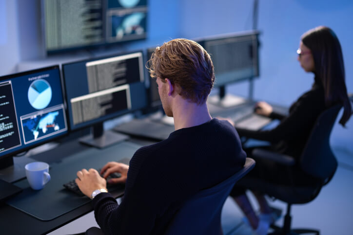 An IT student practising network security skills during hands-on cybersecurity training
