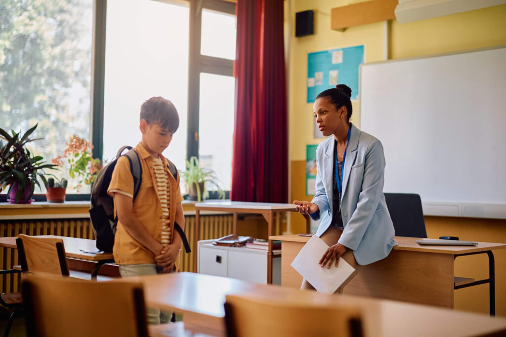 Education Assistant trainee learning de-escalation and communication strategies